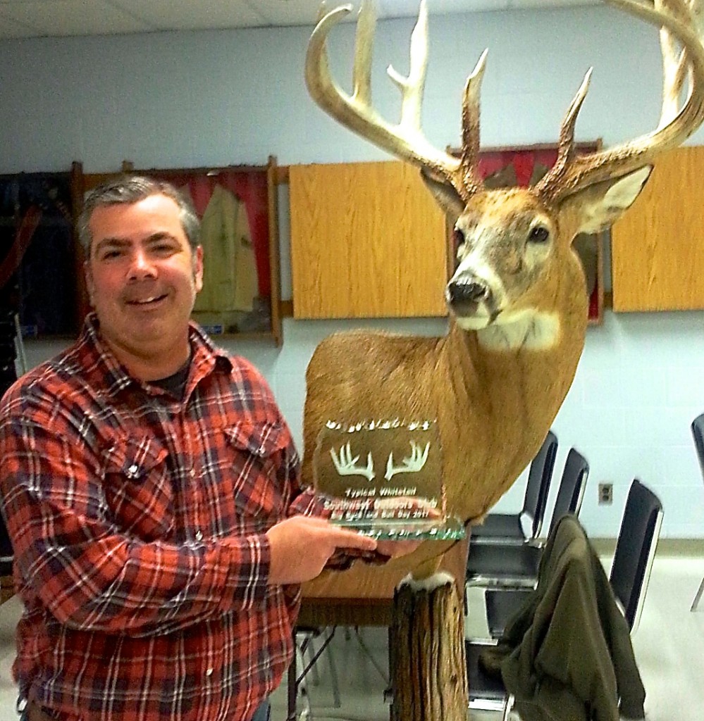 Doug Daniels with his huge monster buck, Ontario's 2nd largest crossbow buck. Awesome work by Taxidermy by Robert Beneteau